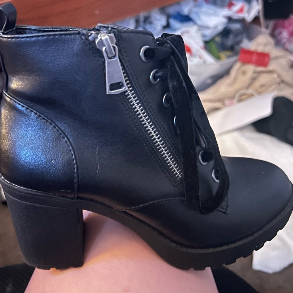 A black pair of Mossimo high heel boots